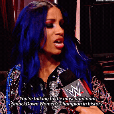 Woman With Blue Hair Holding Microphone Talking To Smackdown Champion GIF