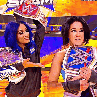 Woman With Blue Hair Holding Wrestling Championship GIF