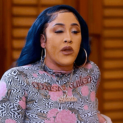 Woman With Blue Hair, Hoop Earrings, Pink Black Floral Shirt GIF