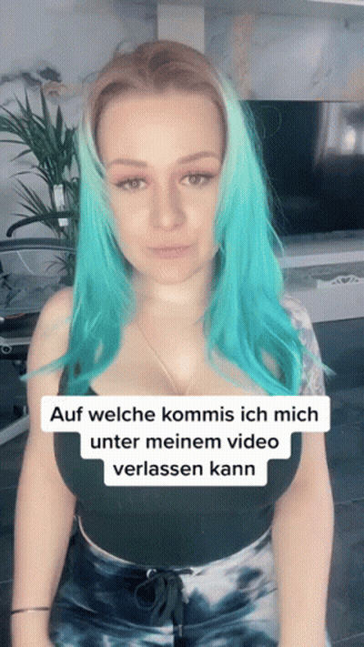 Woman With Blue Hair In Black Tank Top GIF