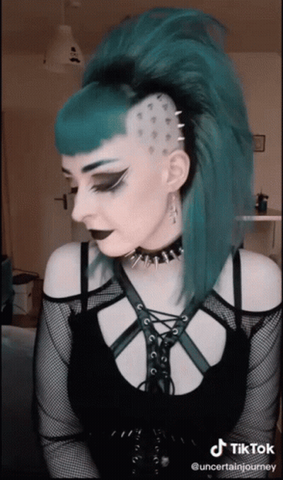 Woman With Blue Hair In Black Top And Choker GIF