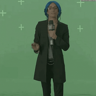 Woman With Blue Hair In Front Of Green Screen GIF