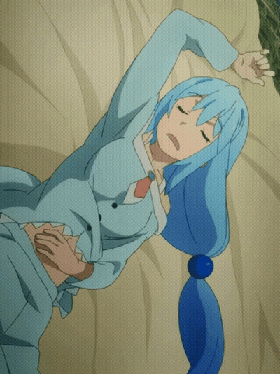 Woman With Blue Hair Laying On Bed Eyes Closed GIF