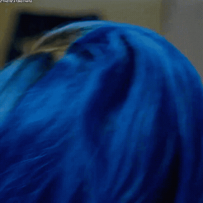 Woman With Blue Hair Looking Down GIF