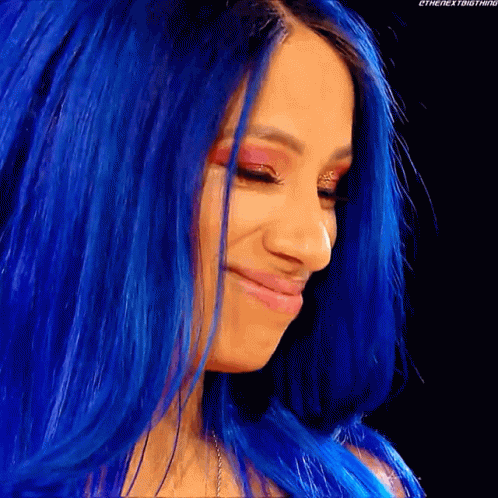Woman With Blue Hair Making Funny Face GIF