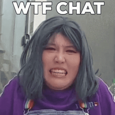 Woman With Blue Hair Making Funny Face In Purple Sweater GIF