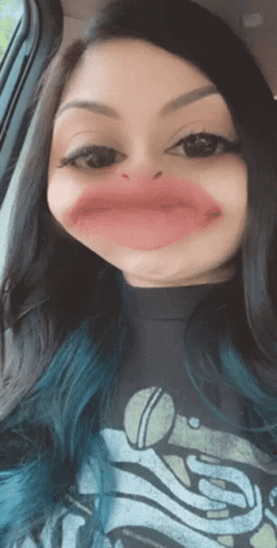 Woman With Blue Hair Making Funny Face GIF