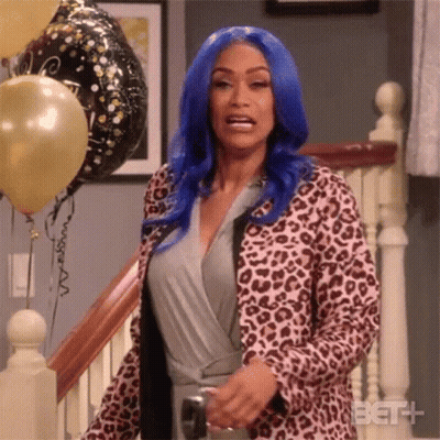 Woman With Blue Hair On Staircase With Balloons GIF