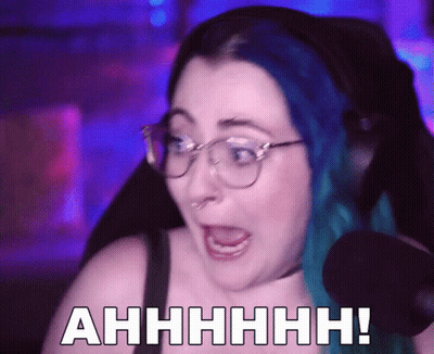 Woman With Blue Hair Saying Ahhhh Into Mic