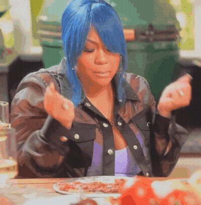 Woman With Blue Hair Sitting At Table With Food GIF