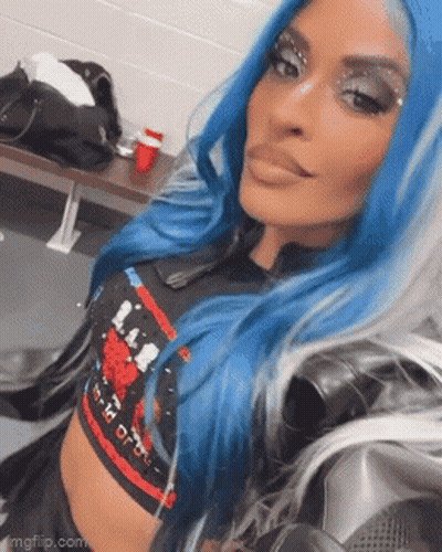 Woman With Blue Hair Taking Selfie GIF