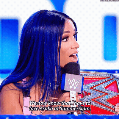 Woman With Blue Hair Talking Into Microphone Says We Now Know That I Have To Face Asuka At Summerslam GIF