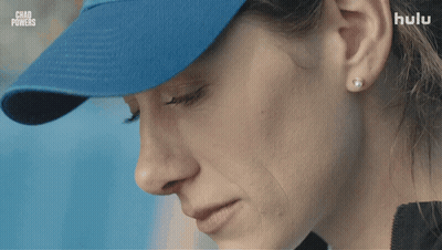 Woman With Blue Hat With Chad Powers Behind GIF