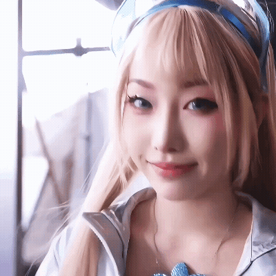 Woman With Blue Headband Close Up GIF