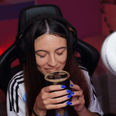 Woman With Blue Nails Holding Coffee GIF