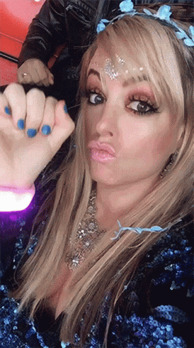 Woman With Blue Nails In Blue Sequined Dress GIF