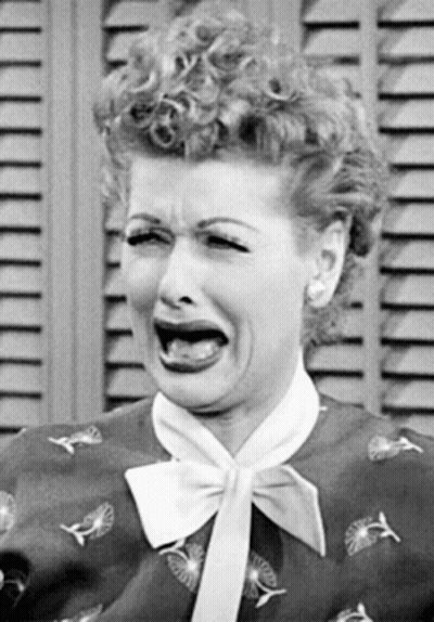 Woman With Bow Tie Making Funny Face GIF