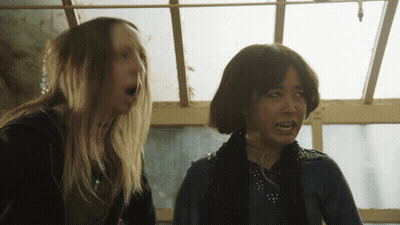 Woman With Braces Smiling In Purple Shirt GIF