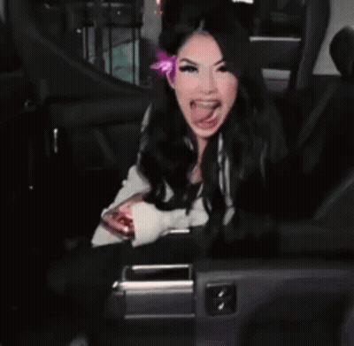 Woman With Braces Sticking Tongue Out GIF