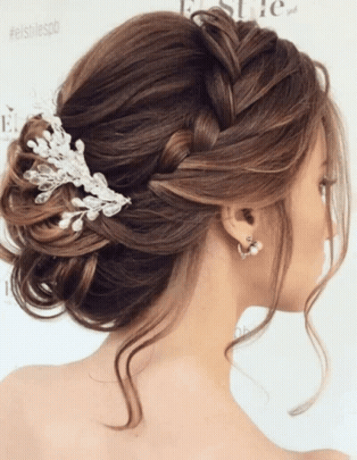 Woman With Braided Bun And Pearl Comb GIF