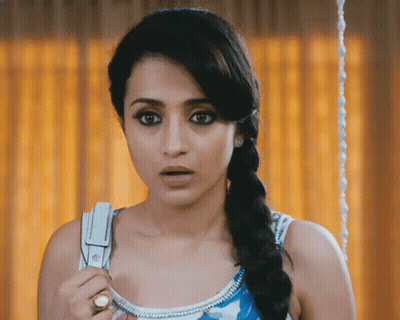 Woman With Braided Hair Holding Scissors GIF