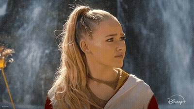 Woman With Braided Ponytail And Disney Logo GIF