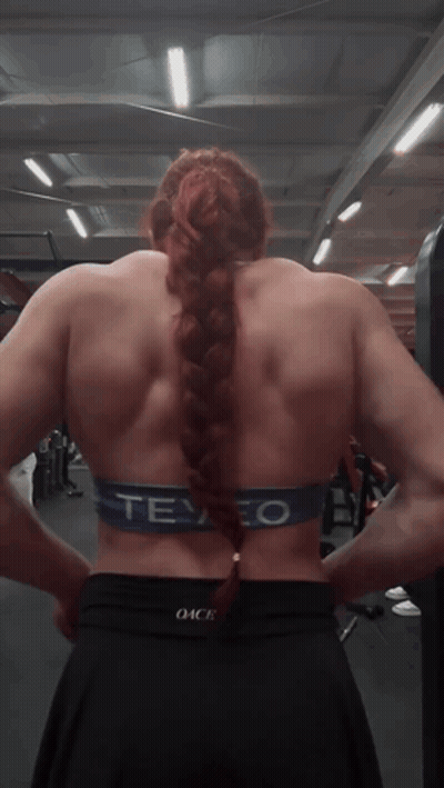 Woman With Braided Ponytail In Gym Wearing Tevao Bra GIF