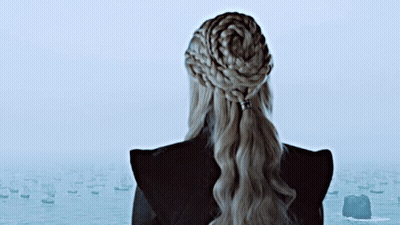 Woman With Braided Ponytail Looking Over Water GIF