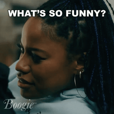 Woman With Braids And Hoop Earrings Says What's So Funny GIF