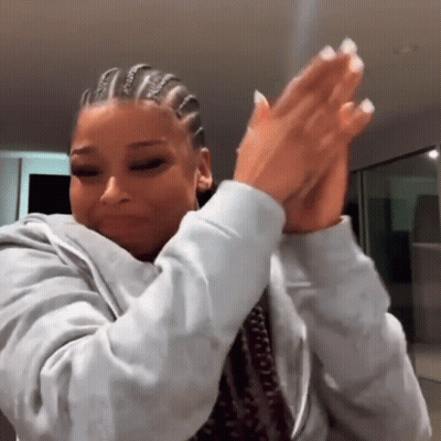 Woman With Braids Clapping Hands GIF