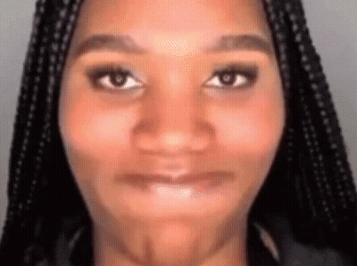 Woman With Braids Making Funny Face GIF