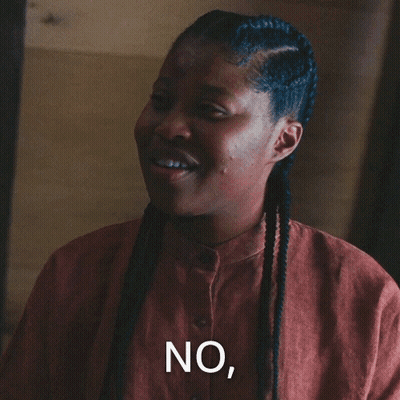 Woman With Braids Making Funny Face Saying I Never Said That GIF