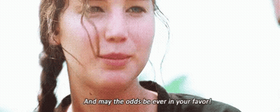 Woman With Braids Saying May The Odds Be GIF