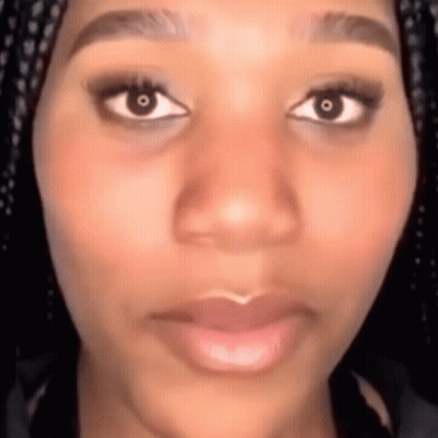 Woman With Braids Serious Look GIF