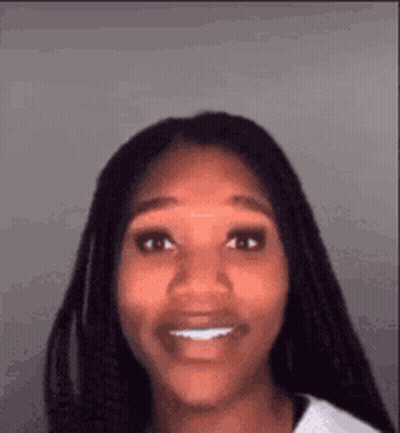 Woman With Braids Smiling GIF