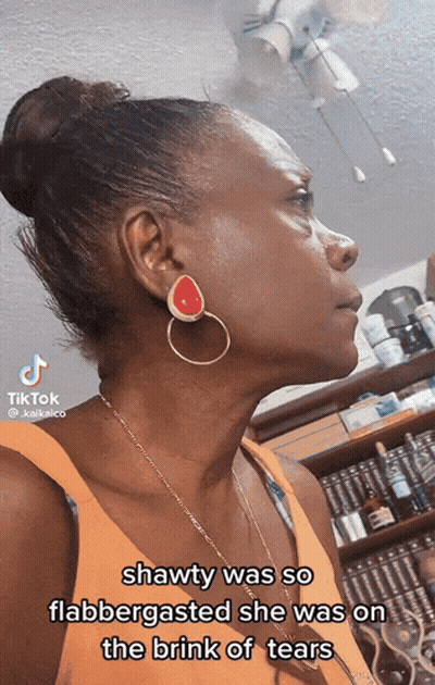 Woman With Bun And Earrings With TikTok Sticker GIF