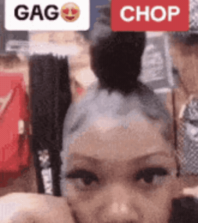 Woman With Bun And Red Chop Button GIF