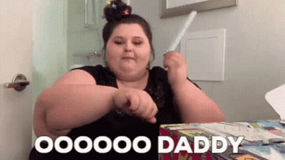 Woman With Bun Holding Toothbrush Saying Oooo Daddy GIF