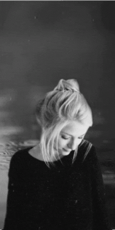 Woman With Bun In Hair GIF