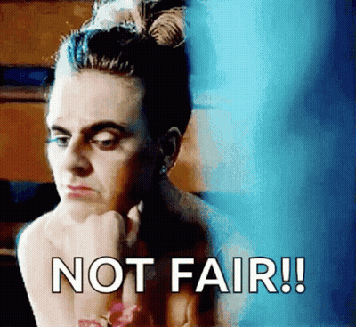 Woman With Bun Saying Not Fair GIF