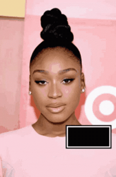 Woman With Bun Standing In Front Of Target Logo GIF