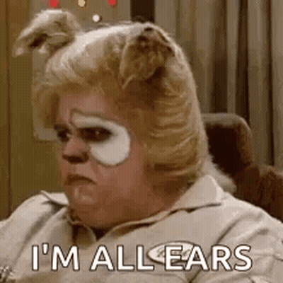 Woman With Bunny Ears And Bandage Sitting GIF