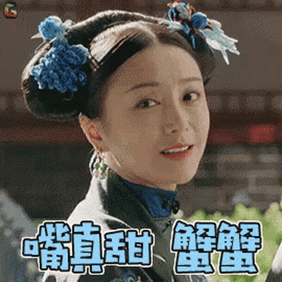 Woman With Chinese Writing On Face And Blue Flower Bun GIF