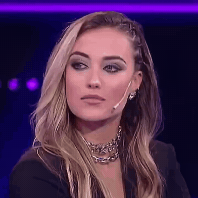 Woman With Choker and Earrings Looking at Camera