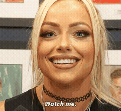 Woman With Choker Smiling Says Watch Me GIF
