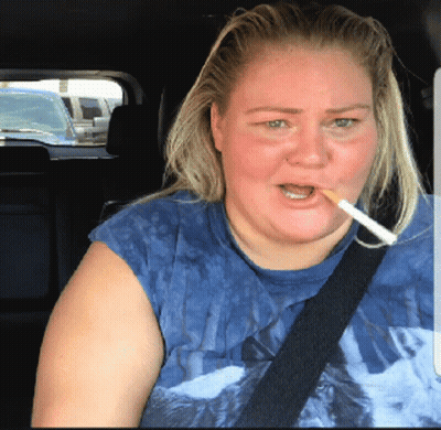 Woman With Cigarette In Blue Shirt GIF