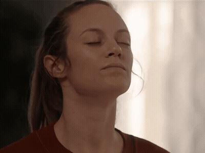 Woman With Closed Eyes And Ponytail GIF