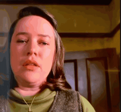 Woman With Cross Necklace GIF