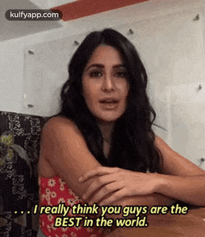 Woman With Crossed Arms Talking To Man GIF