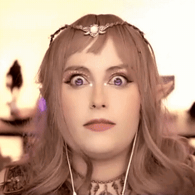 Woman With Crown And Earphones Making Funny Face GIF